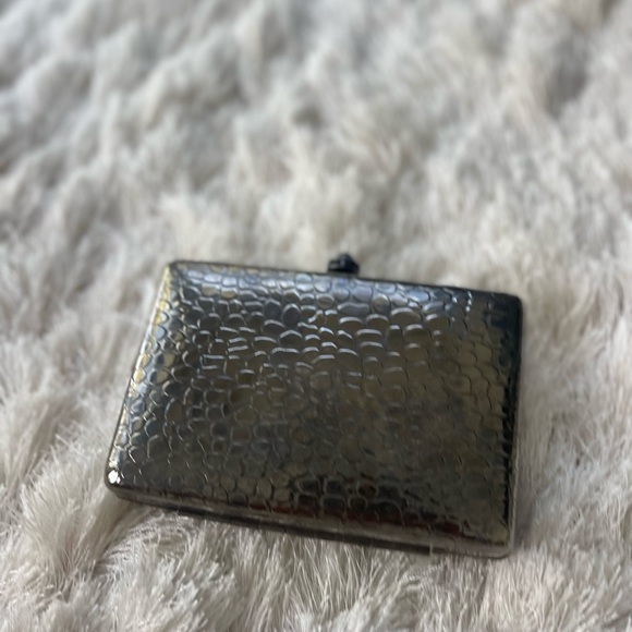 BCBGMaxAzria Handbags - BCBG cute little evening purse .  In perfect condition.  Silver